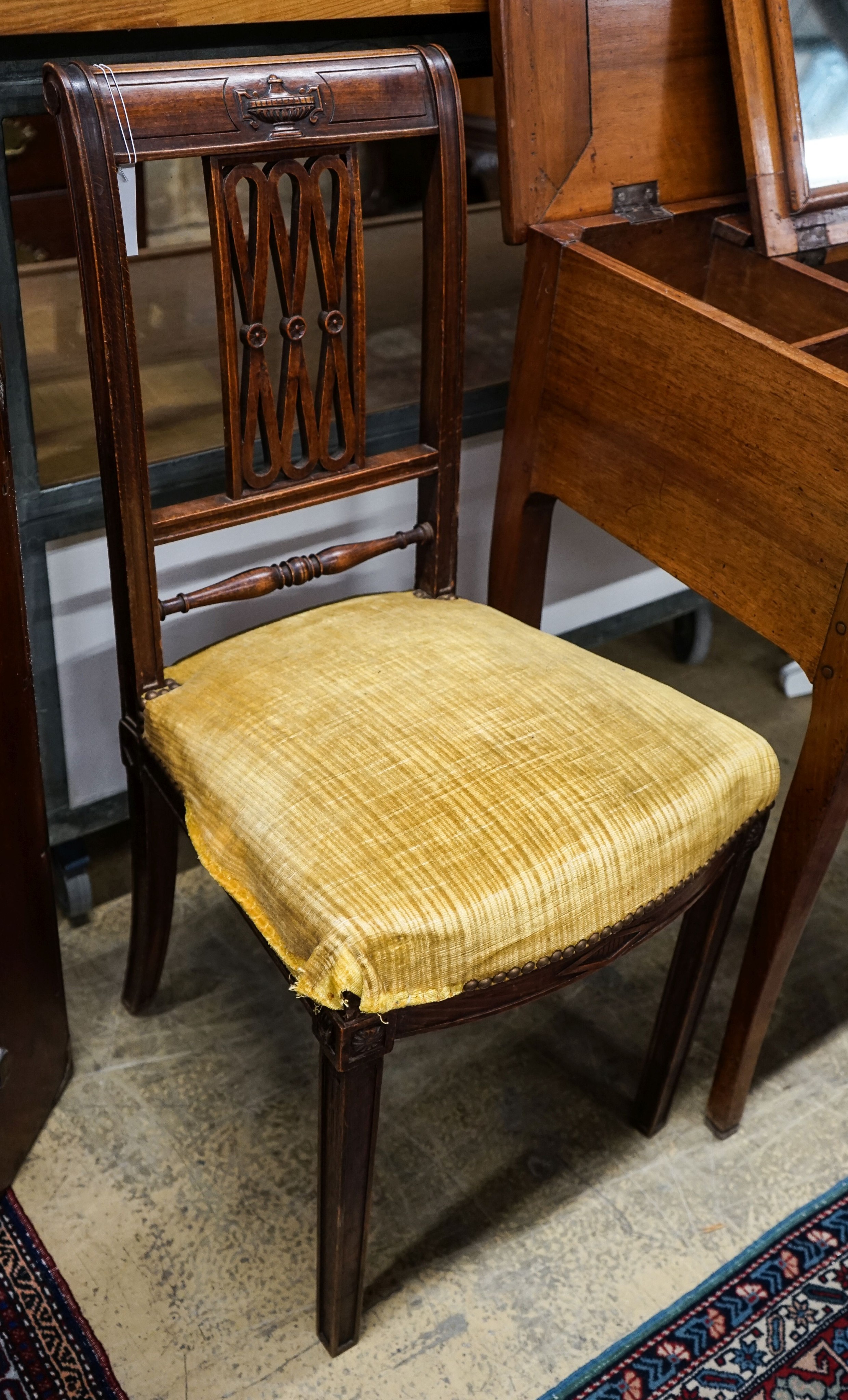 An Italian hall chair, with upholstered seat